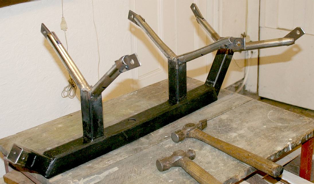 STEEL CHASSIS - This is the frame for Anthony the giant prehistoric insect. Click on the picture to see how it was made from (mostly) scrap metal and recycled cycle parts.