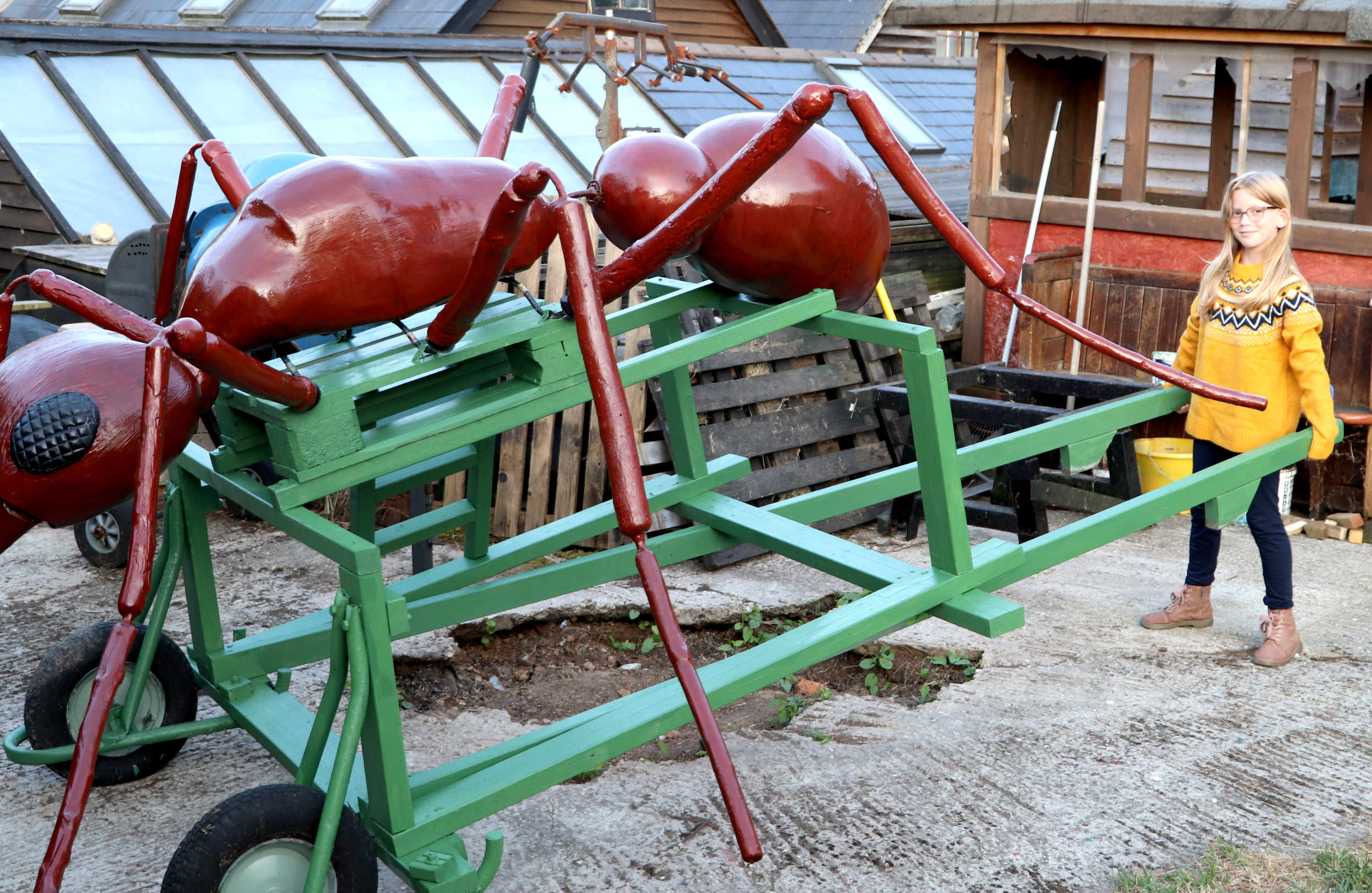 WOW - Miss Ocean was able to lift and push the cart, with Anthony taking a ride. Copyright photograph  August 2024, all right reserved, Herstmonceux Museum Limited. You will need permission from the author or Lime Park Heritage Trust in order to use this picture.